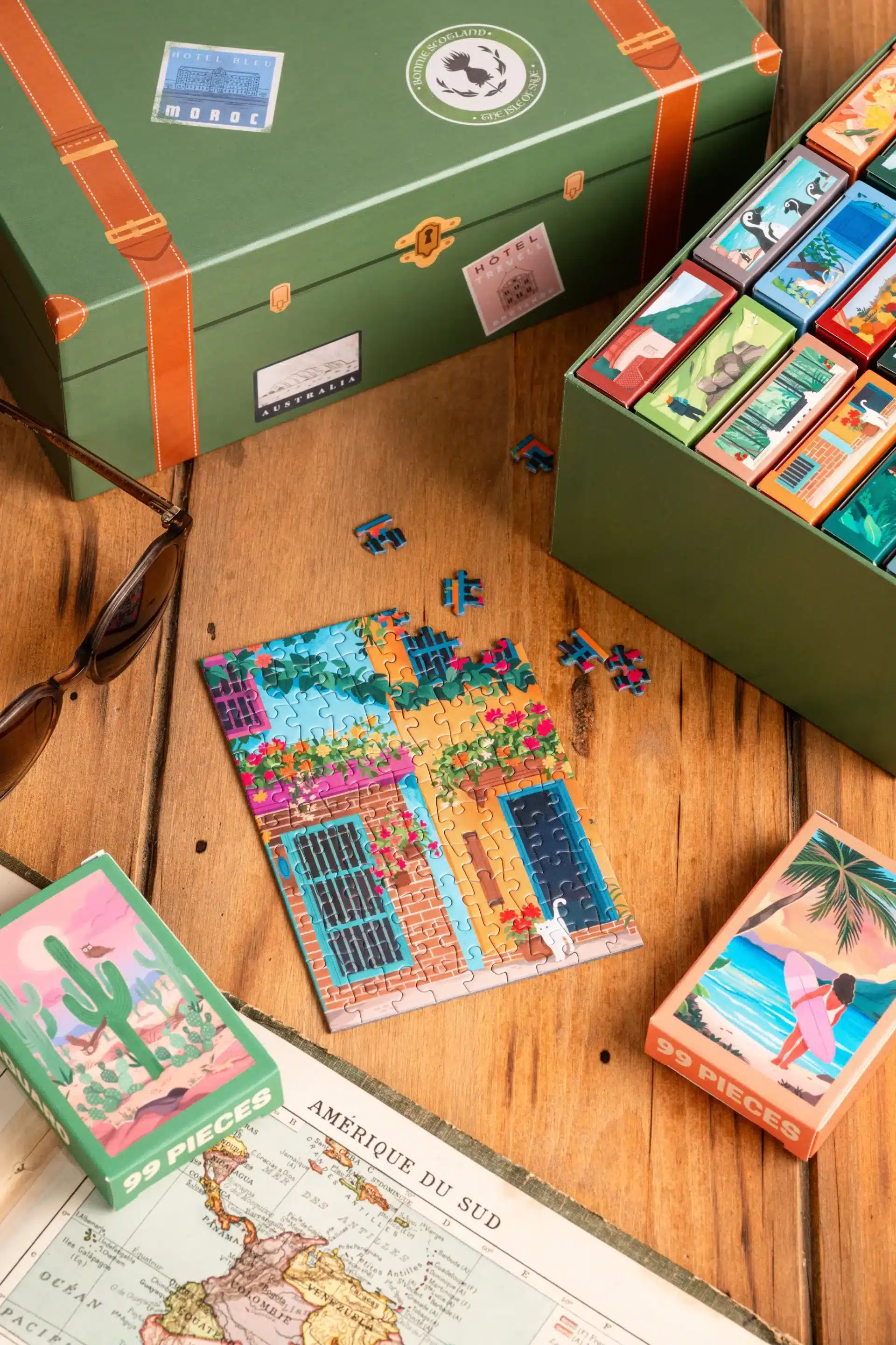 Coffret La Malle à souvenirs de la marque Trevell composé de 24 minis puzzles